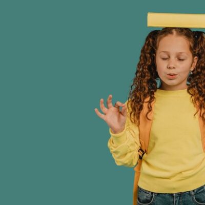 school-girl-with-yellow-shirt-holding-book-head-copy-space_23-2148764059 تنظیم هیجان (Emotional Regulation)