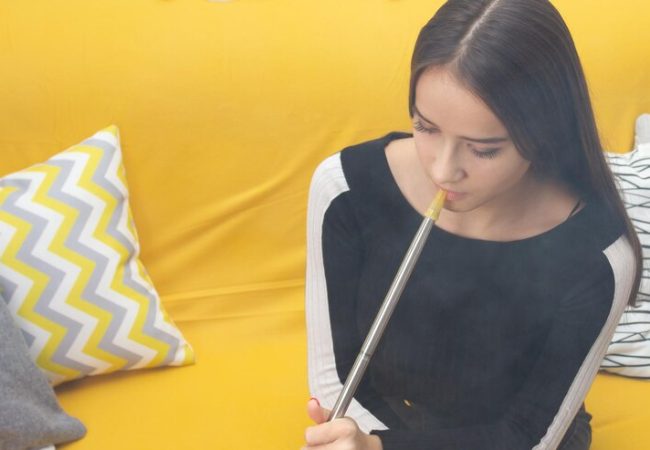 recreation-entertainment-young-beautiful-girl-smokes-hookah-bar-having-fun-with-friends-smiling-drinking_165545-1763 • جویدن یقه لباس یا مداد در کودکان به چه معناست؟