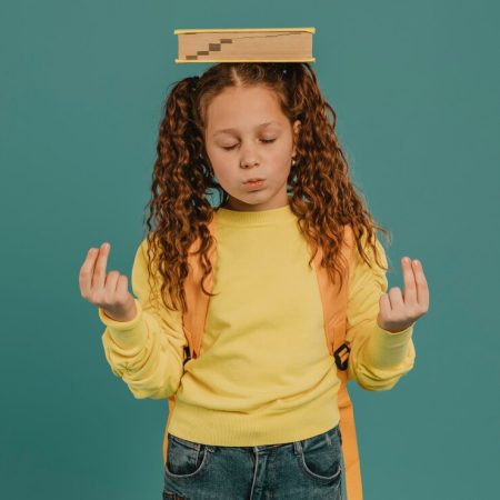 school-girl-with-yellow-shirt-holding-book-head_23-2148764058 school-girl-with-yellow-shirt-holding-book-head_23-2148764058